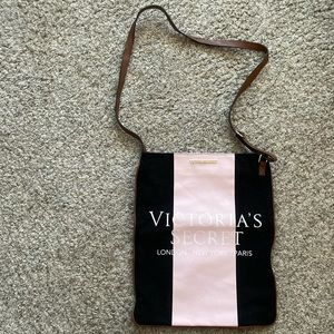 Victoria’s Secret tote bag with adjustable straps.  Black and pink